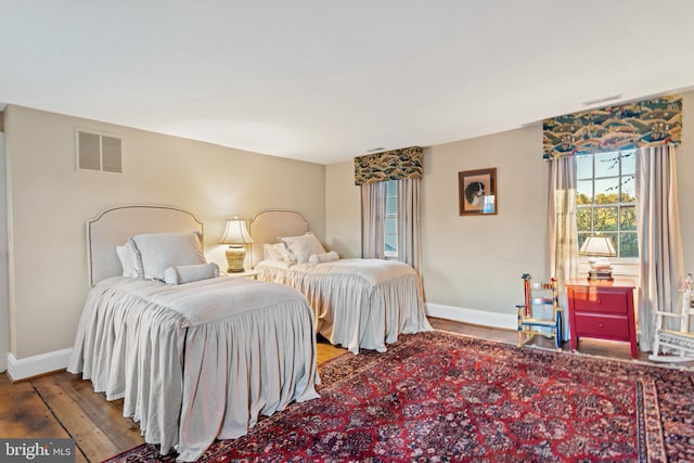 bedroom featuring hardwood / wood-style flooring