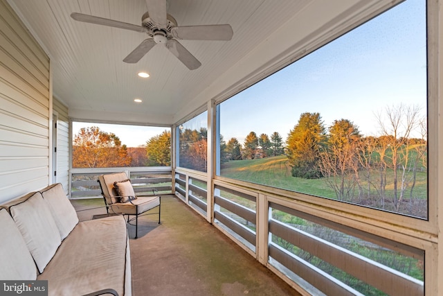 exterior space featuring ceiling fan