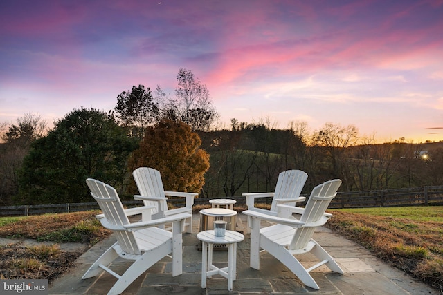 view of patio terrace at dusk