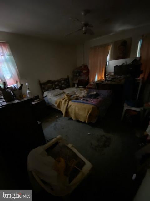 bedroom featuring ceiling fan