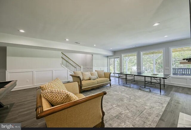 living room with dark wood-type flooring