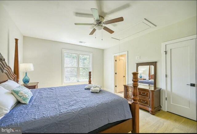 bedroom featuring ceiling fan and light hardwood / wood-style flooring