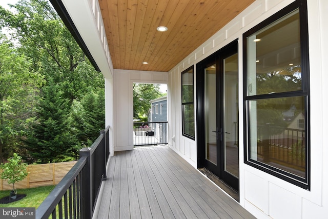 wooden deck with french doors