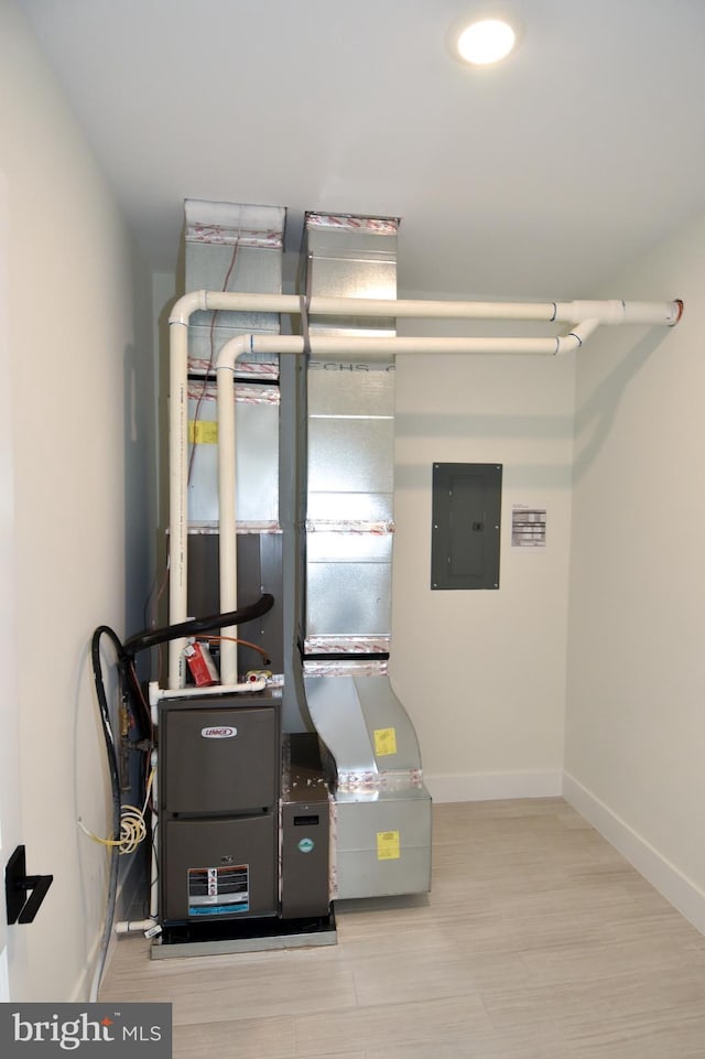 utility room with electric panel