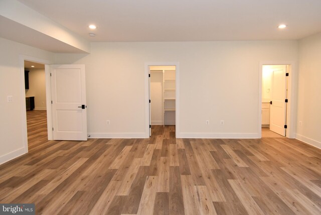 unfurnished room featuring light hardwood / wood-style flooring