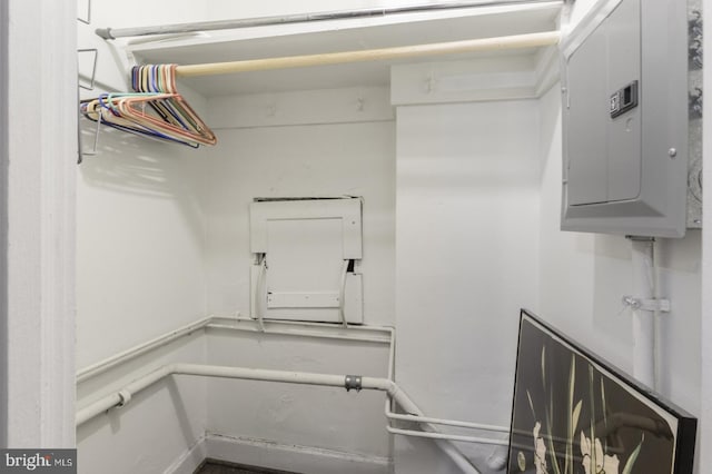 spacious closet featuring electric panel