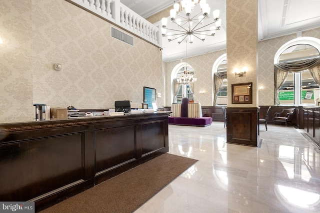 reception area featuring a chandelier