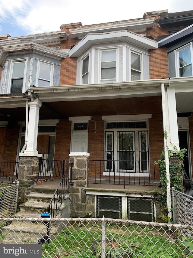 view of property with a porch