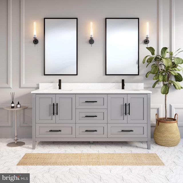 bathroom featuring double vanity and tile flooring