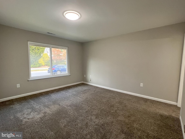 view of carpeted spare room