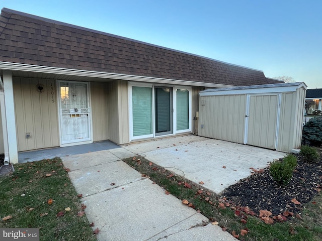 doorway to property with a patio