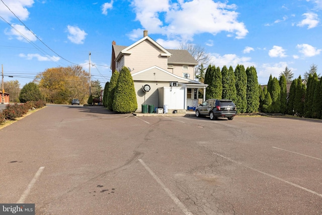 view of property exterior with a garage