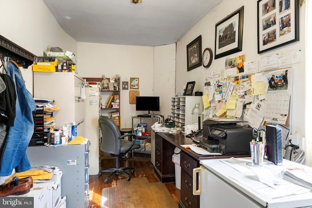 home office featuring dark hardwood / wood-style flooring