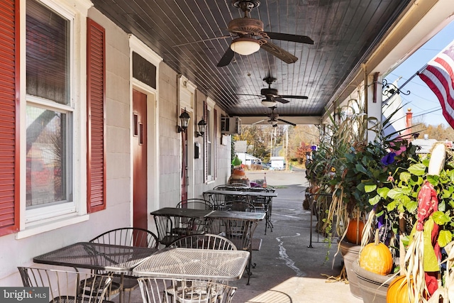 view of patio featuring ceiling fan