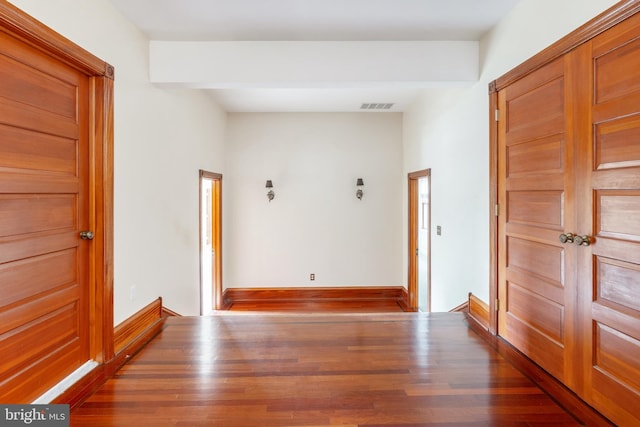 interior space with dark wood-type flooring