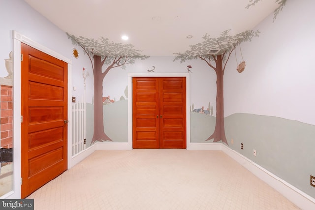 interior space with light colored carpet