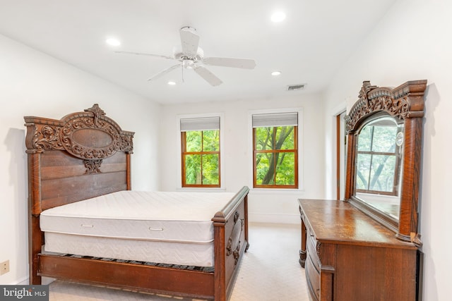 carpeted bedroom with ceiling fan