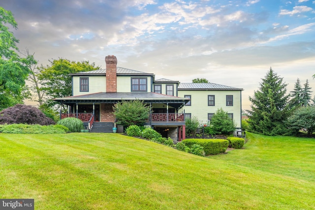 exterior space featuring a front lawn