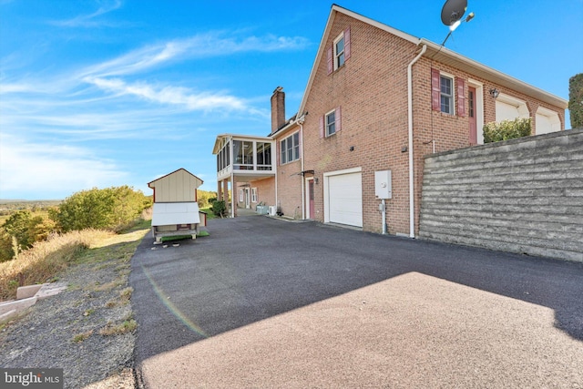 view of home's exterior featuring a garage