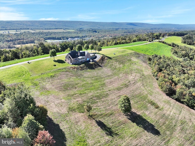 birds eye view of property featuring a rural view