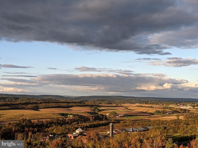 property view of mountains featuring a rural view