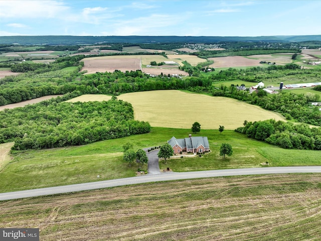 birds eye view of property featuring a rural view