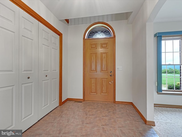 entryway with light tile floors