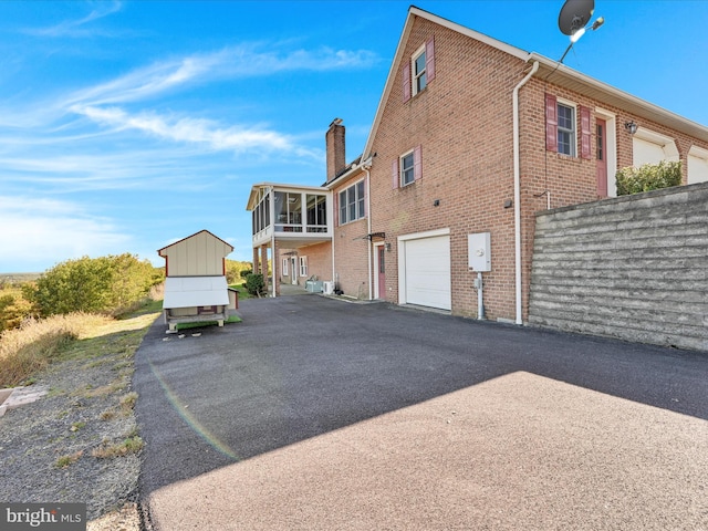 view of home's exterior featuring a garage