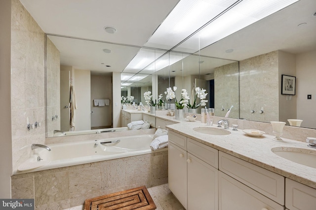 202 W Rittenhouse Sq Unit 1105, Philadelphia, PA 19103 - bathroom with a garden tub and double vanity