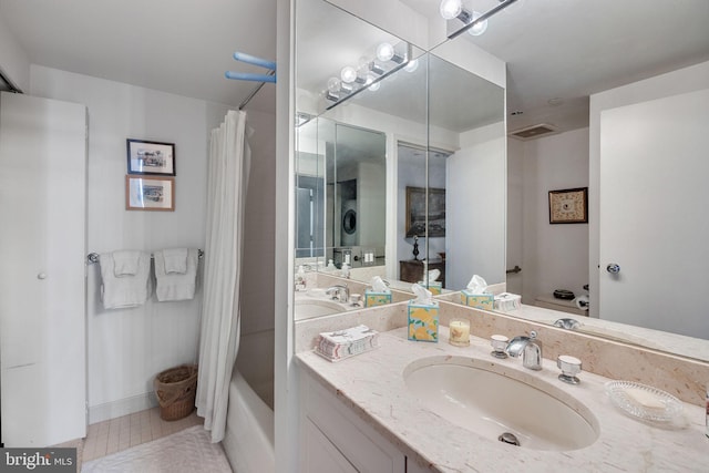 202 W Rittenhouse Sq Unit 1105, Philadelphia, PA 19103 - full bath with vanity, tile patterned flooring, shower / bath combo with shower curtain, and washer / clothes dryer