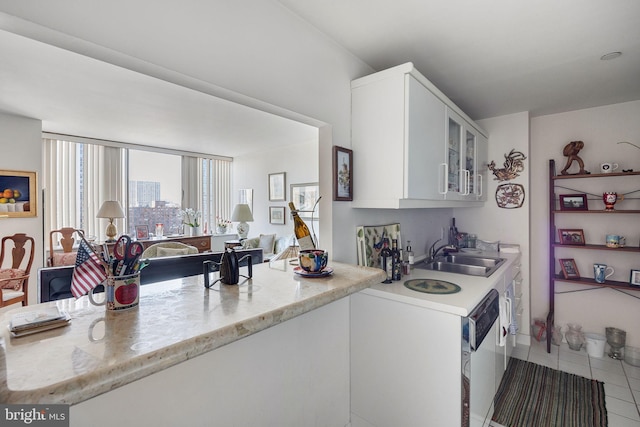 202 W Rittenhouse Sq Unit 1105, Philadelphia, PA 19103 - kitchen featuring a sink, glass insert cabinets, white cabinets, white dishwasher, and light tile patterned floors