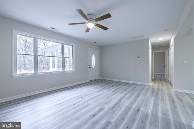 interior space with light hardwood / wood-style floors and ceiling fan