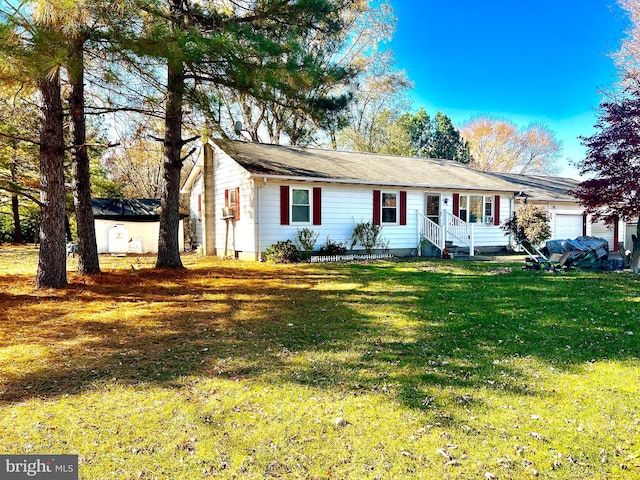 ranch-style house with an attached garage and a front lawn