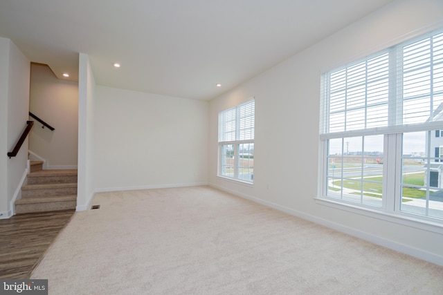 view of carpeted spare room