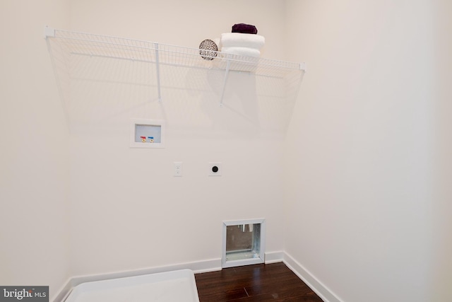 clothes washing area featuring electric dryer hookup, dark wood-type flooring, and hookup for a washing machine