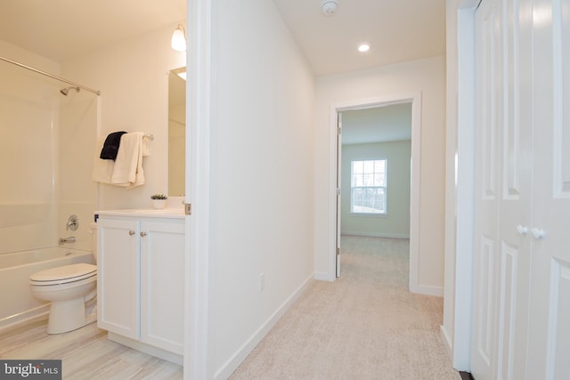 full bathroom with  shower combination, toilet, and vanity