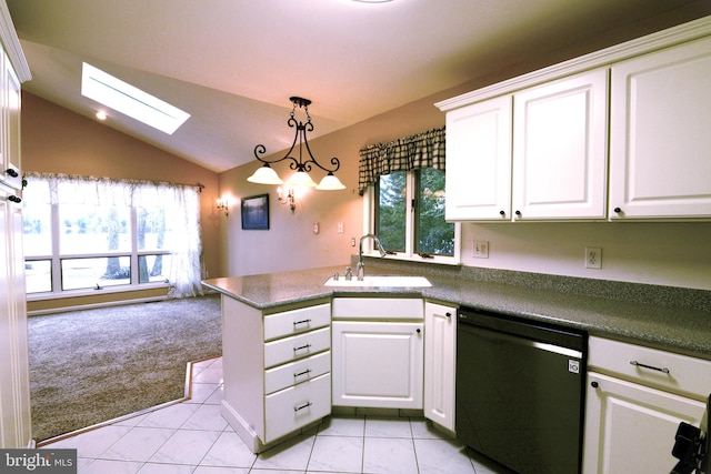 kitchen featuring sink, dishwasher, light colored carpet, vaulted ceiling with skylight, and white cabinets