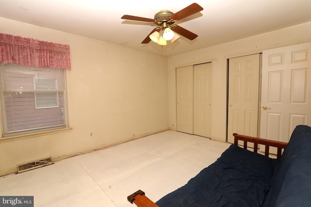 unfurnished bedroom featuring ceiling fan