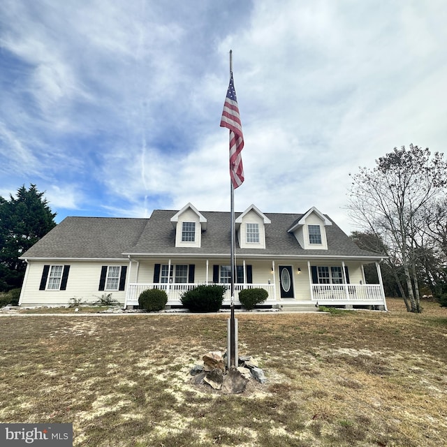 cape cod home with covered porch