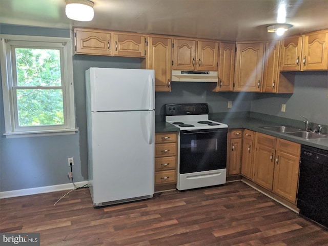 kitchen with white appliances, light brown cabinets, dark wood-type flooring, and sink