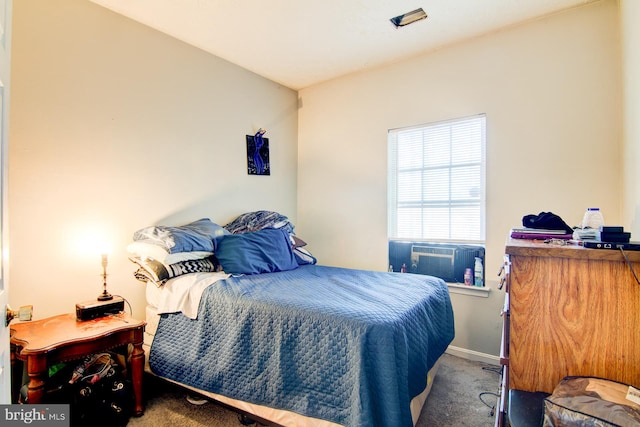 bedroom with dark carpet