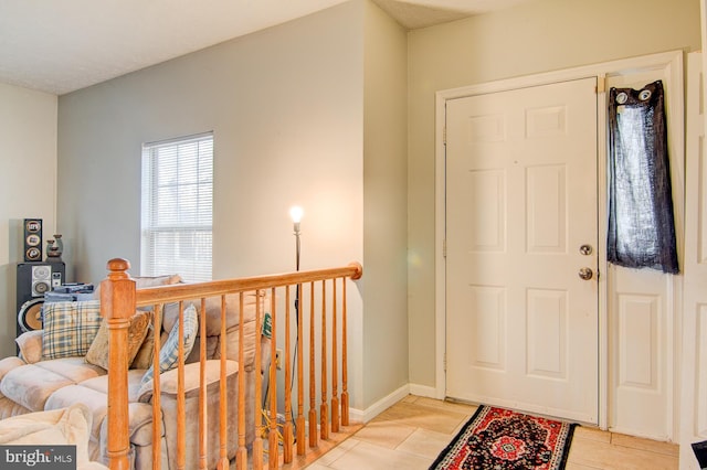 entryway featuring light tile flooring