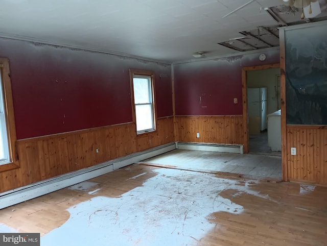 spare room featuring baseboard heating