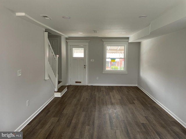 foyer entrance featuring dark hardwood / wood-style flooring