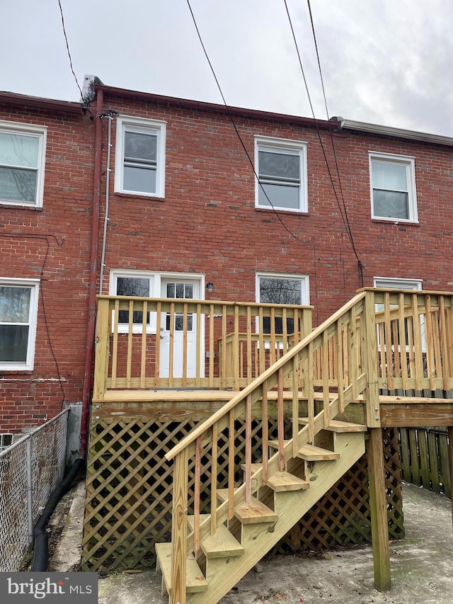 rear view of house with a deck