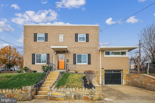 view of front of house with a garage