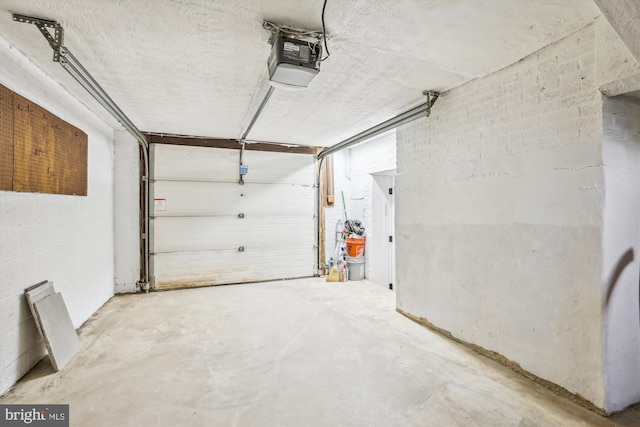 garage featuring a garage door opener