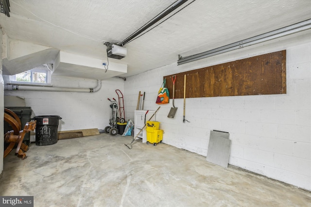 garage featuring a garage door opener