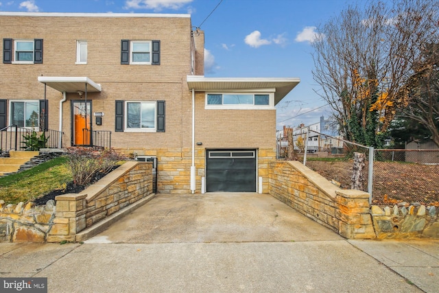 view of front of house with a garage