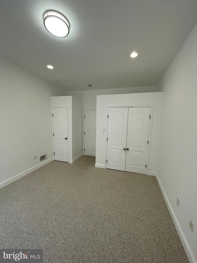 view of carpeted spare room